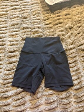 All black lululemon high-rise a line 6 inch biker short